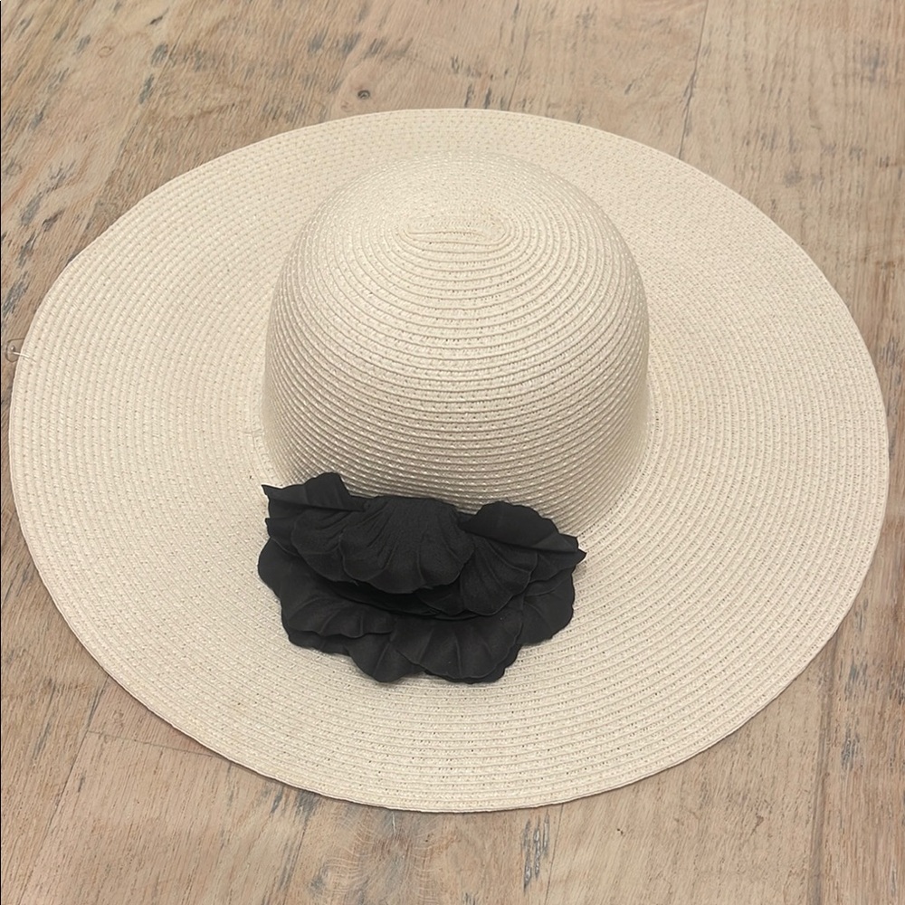 Elegant Cream Sun Hat with Black Floral Accent